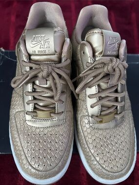 Nike Women’s Air Force 1 Metallic Rose Gold Sneakers